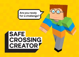 An image of Dot, the Minecraft Safe Crossing Creator character, saying Are you ready for a challenge?, with a yellow background behind them. The Safe Crossing Creator logo is in the bottom left corner of the image.