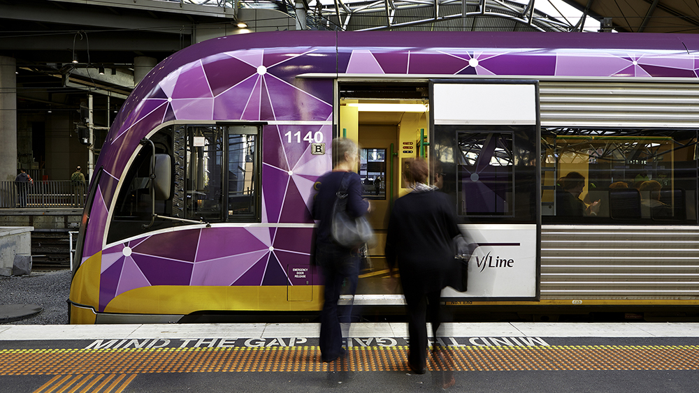 Passengers boarding a VLine train 1000x563