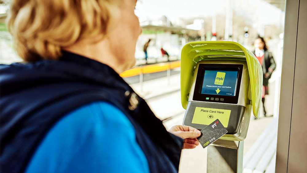 Passenger touching on myki at QTEM