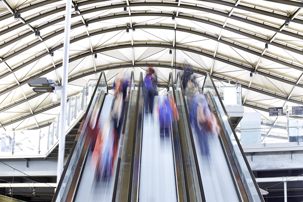 Passengers on escalators at Southern Cross Station