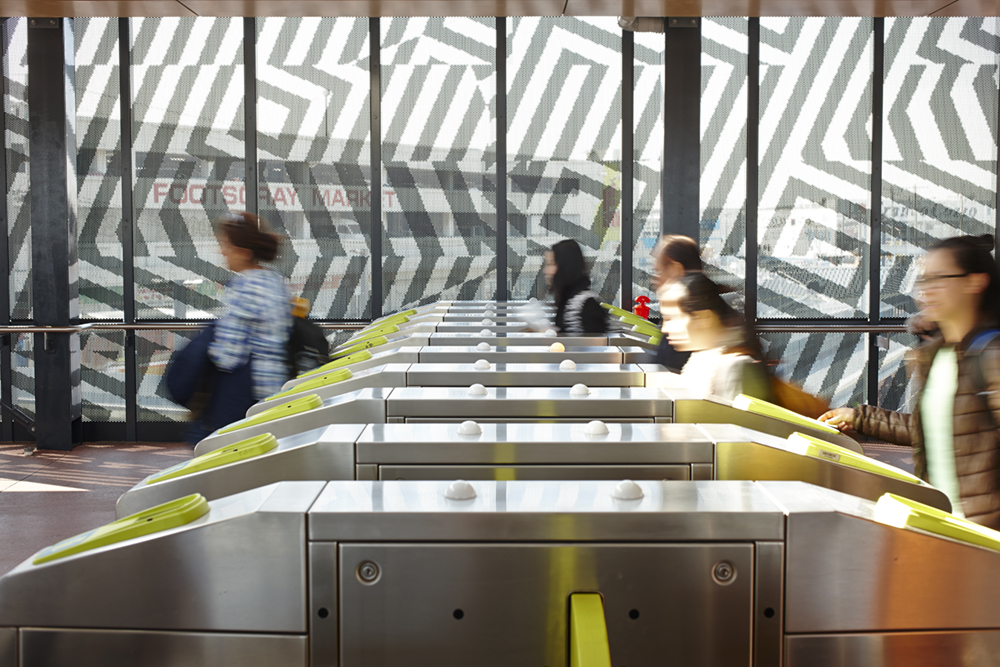 Passengers using myki gates at Footscray Station